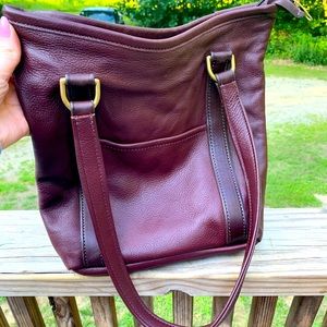 Brand new merlot colored Forest Hill leather bag.